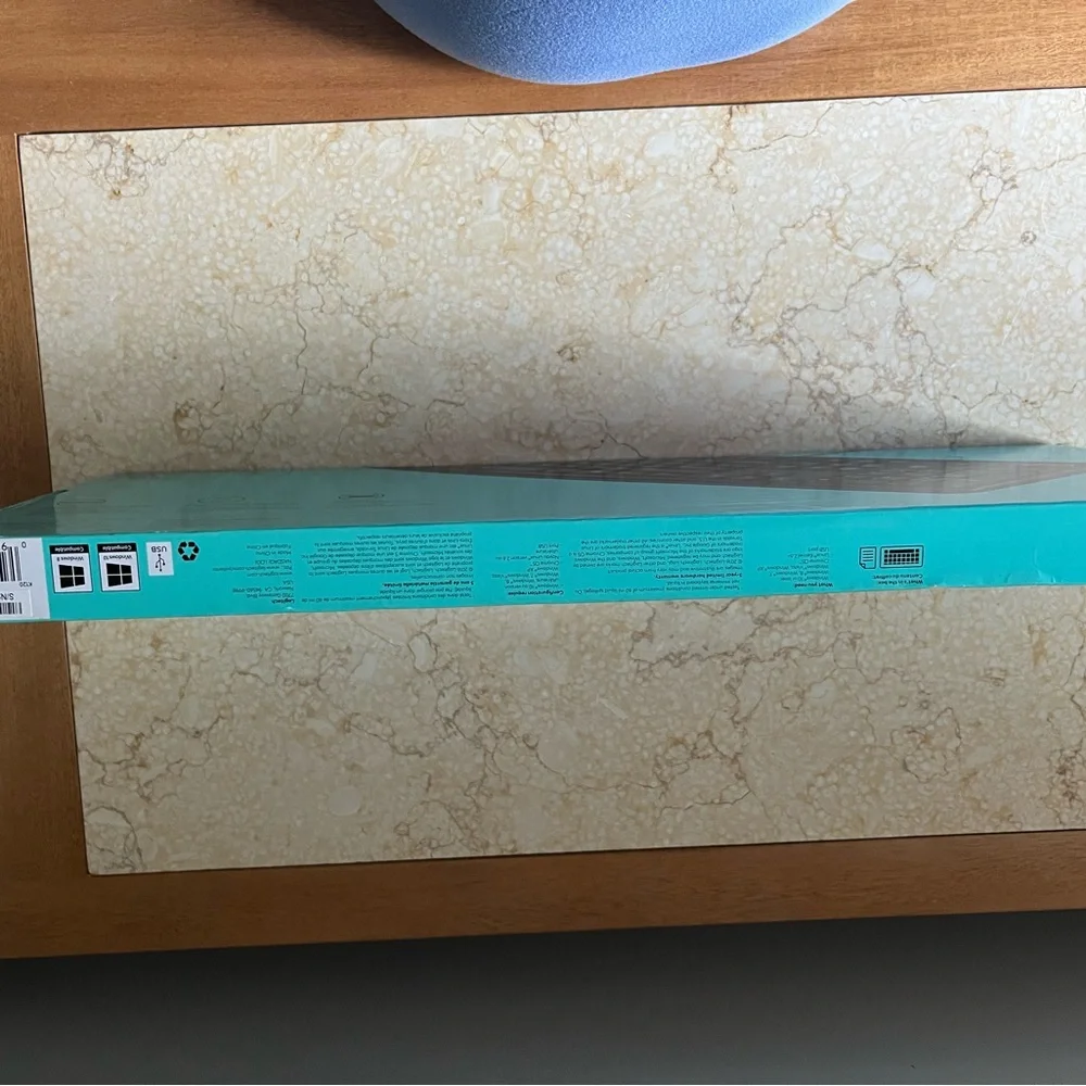 Logitech Teal and White Packaging